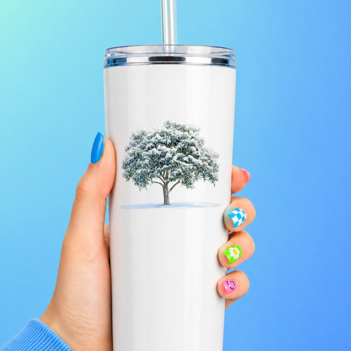 Snow Covered Tree UV DTF sticker applied to a white tumbler