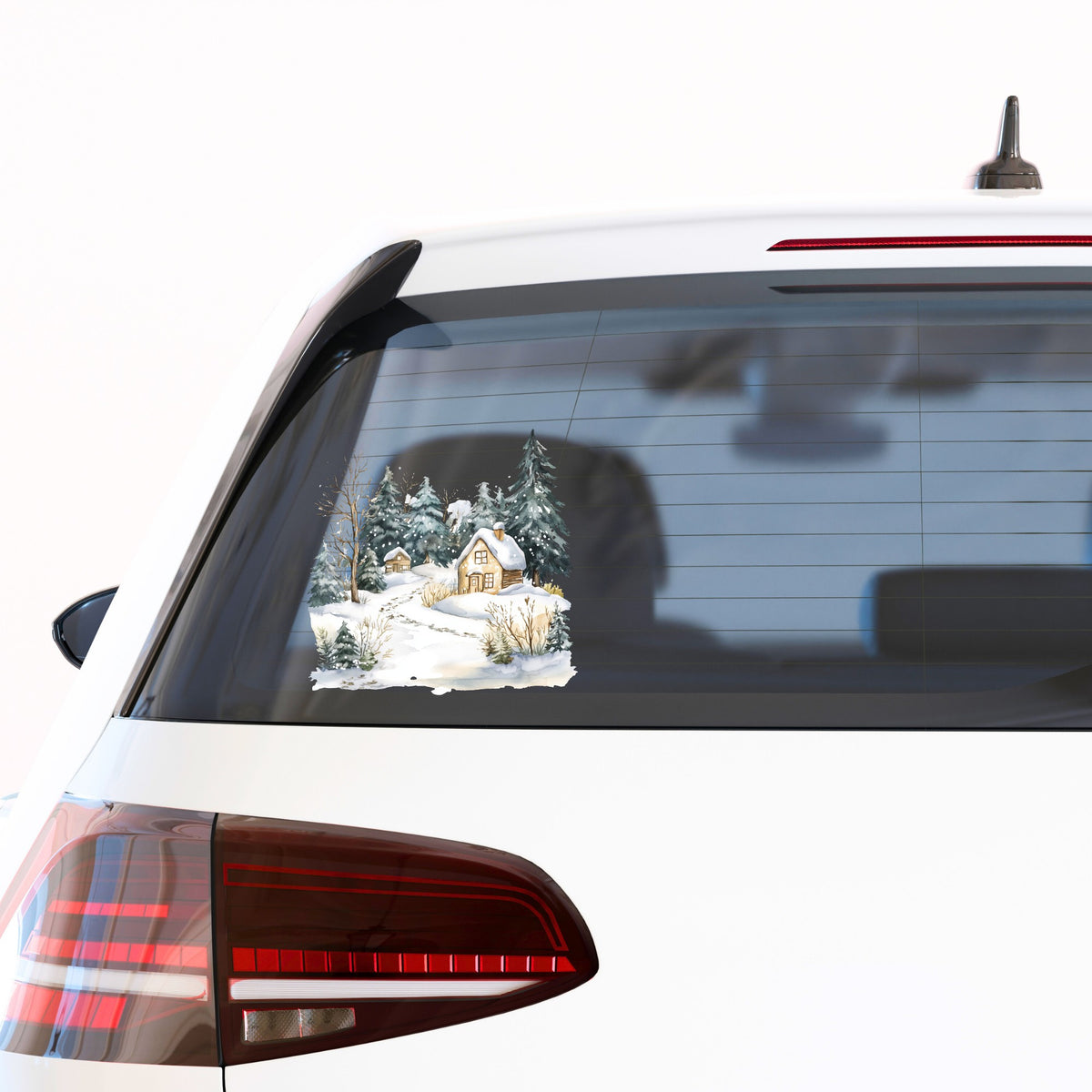 Snowy Cottage Village UV DTF sticker applied to a car window