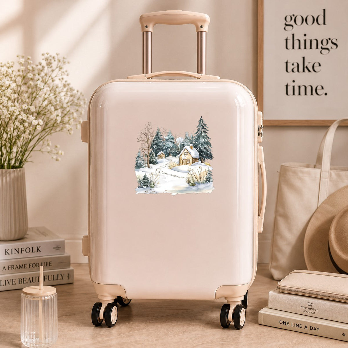 Snowy Cottage Village UV DTF sticker applied to a neutral suitcase