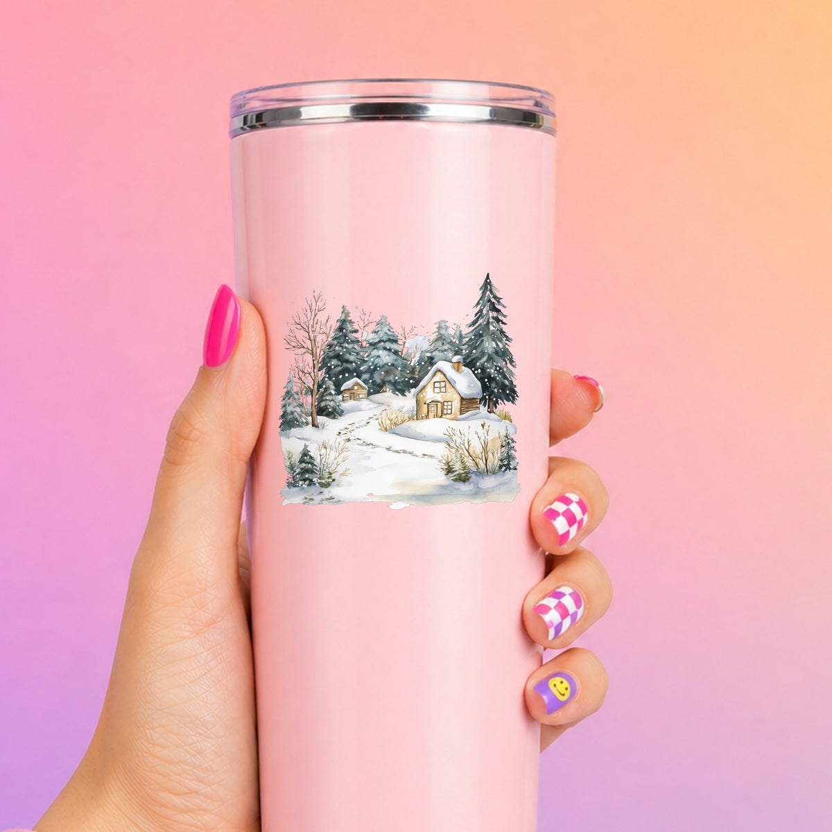 Snowy Cottage Village UV DTF sticker applied to a pink tumbler
