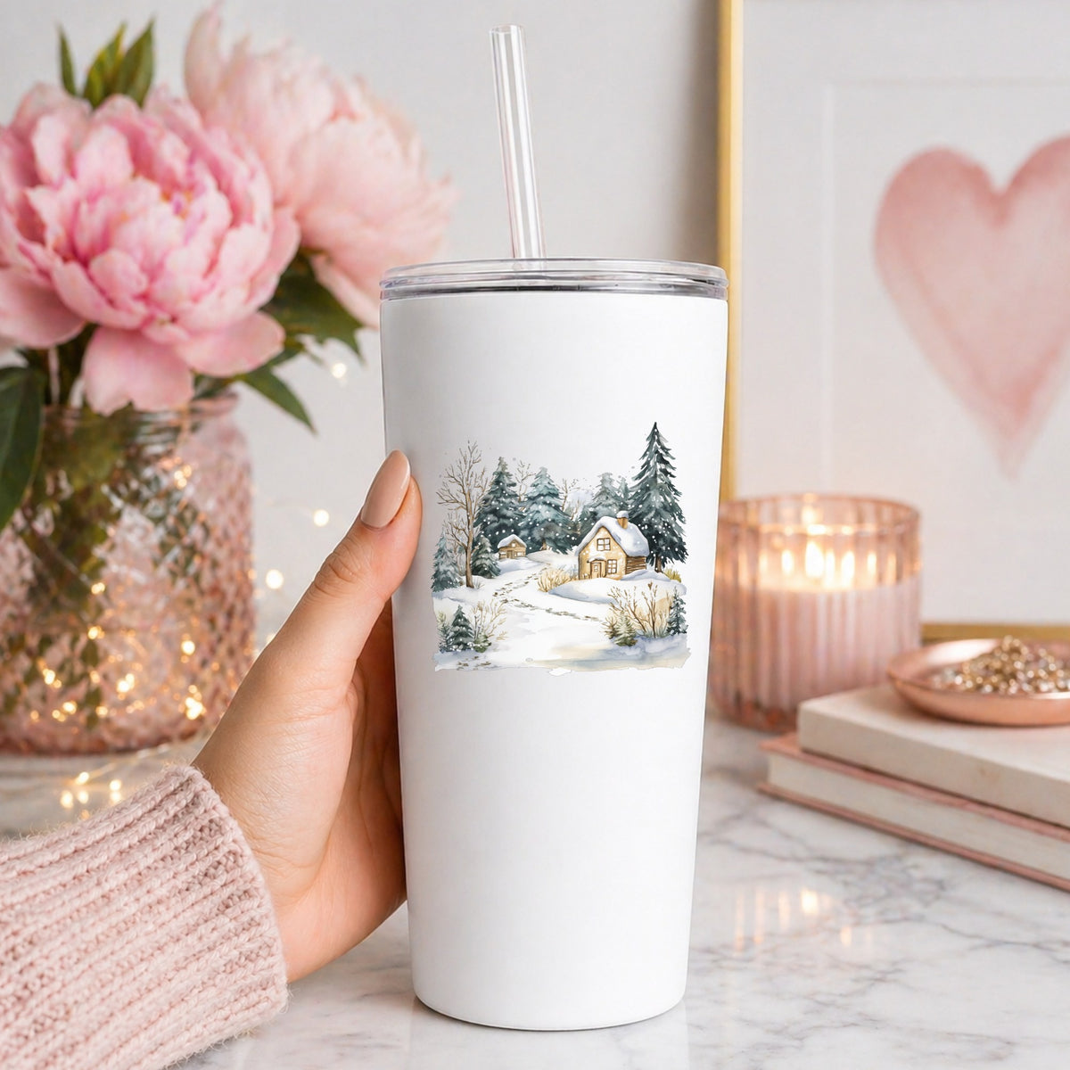 Snowy Cottage Village UV DTF sticker applied to a white tumbler
