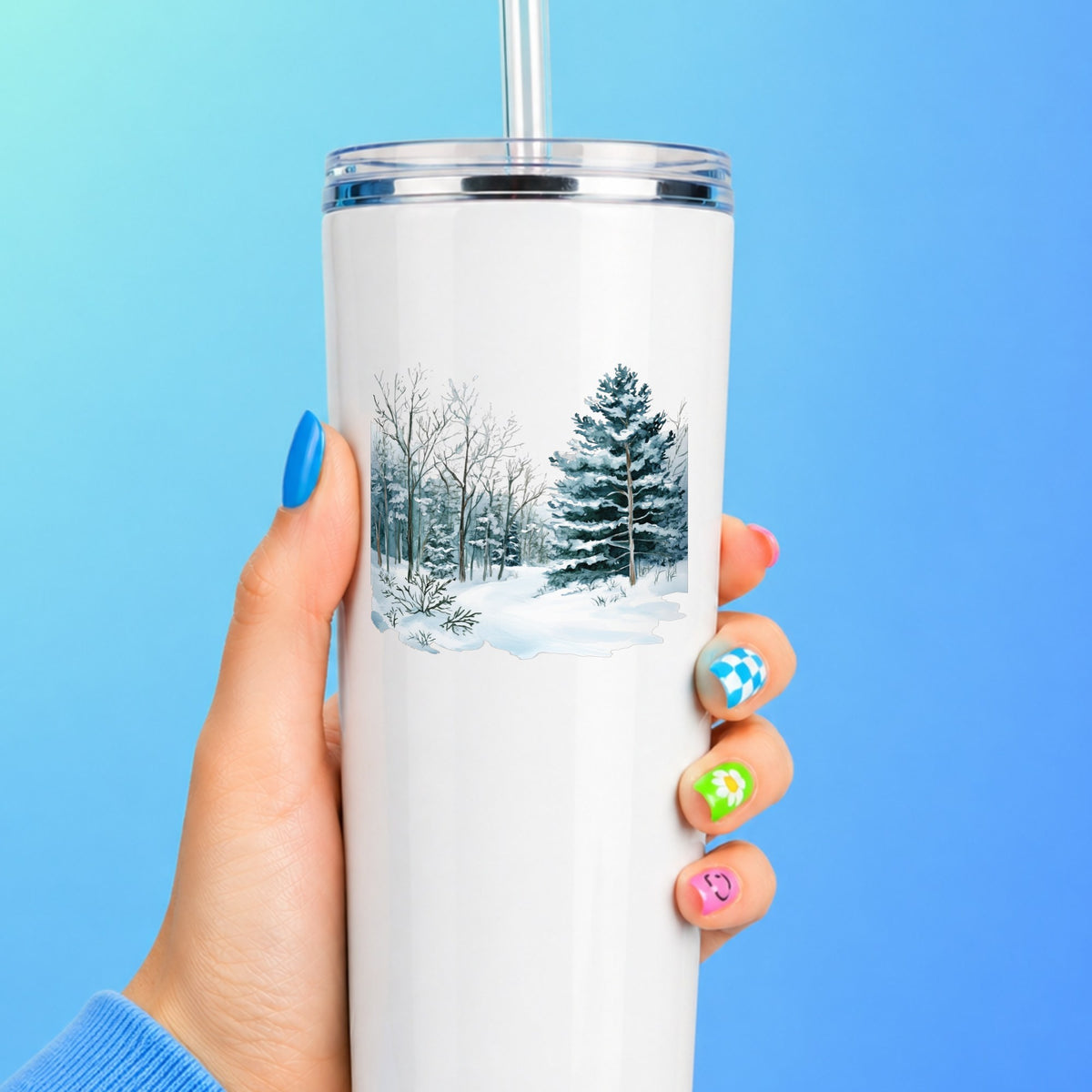 Tall Spruce Winter Forest UV DTF sticker applied to a white tumbler