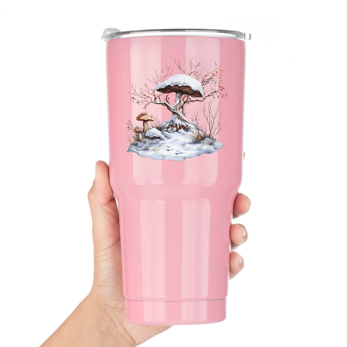 Whimsical Snowy Tree With Mushroom UV DTF sticker applied to a pink tumbler