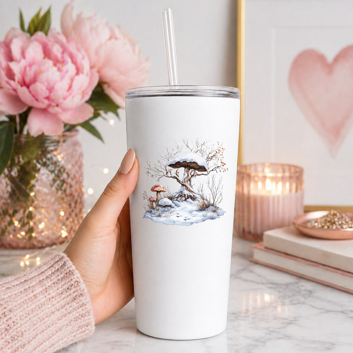 Whimsical Snowy Tree With Mushroom UV DTF sticker applied to a white tumbler