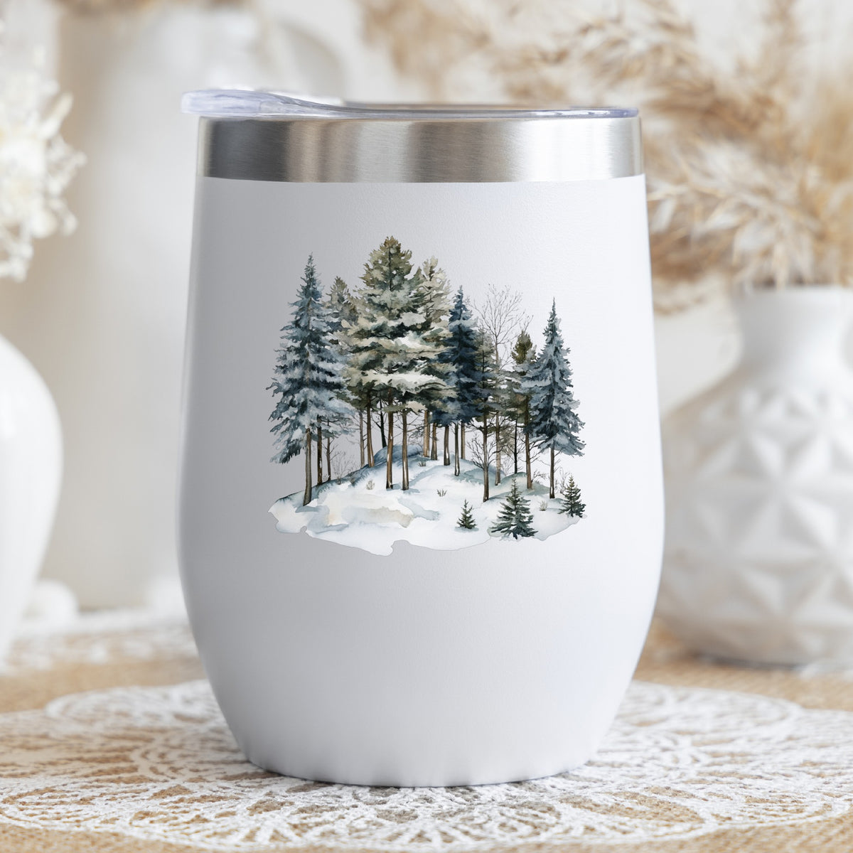 Snowy Pine Hillside UV DTF sticker applied to a stemless wine glass