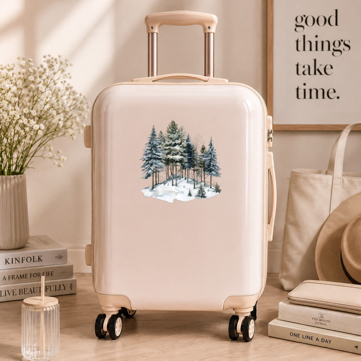 Snowy Pine Hillside UV DTF sticker applied to a neutral suitcase