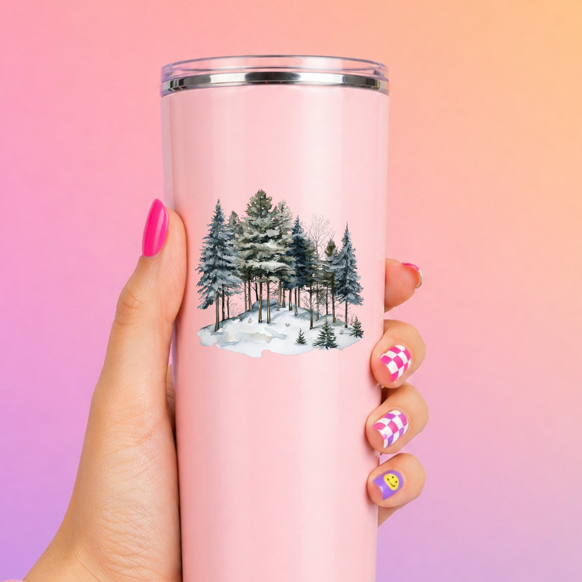 Snowy Pine Hillside UV DTF sticker applied to a pink tumbler