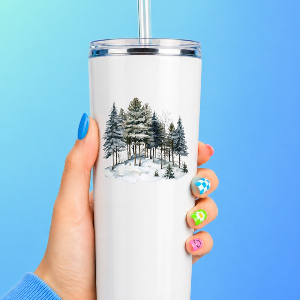 Snowy Pine Hillside UV DTF sticker applied to a white tumbler