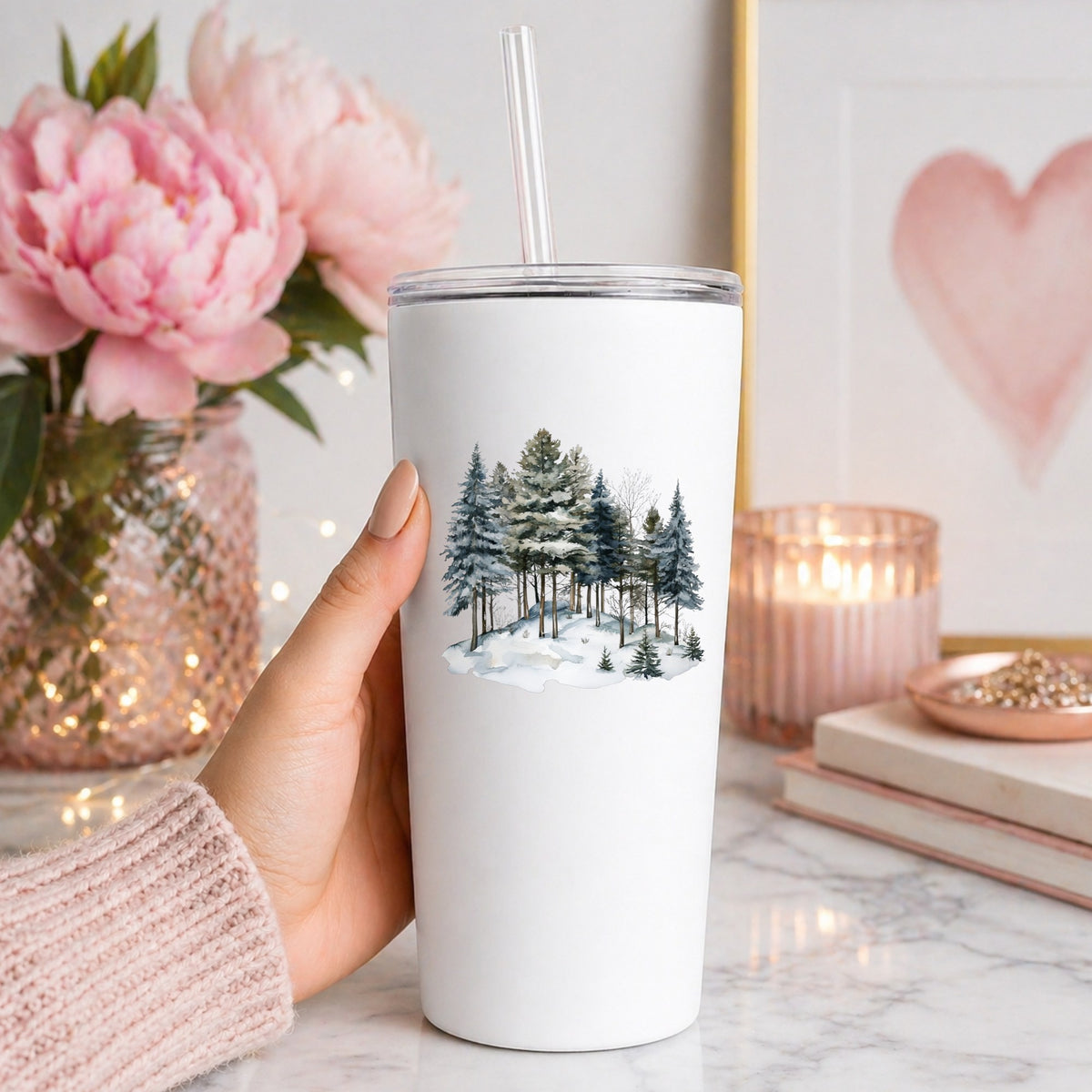 Snowy Pine Hillside UV DTF sticker applied to a white tumbler