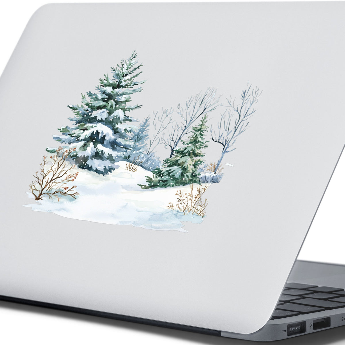 Winter Spruce Grove UV DTF sticker applied to a laptop