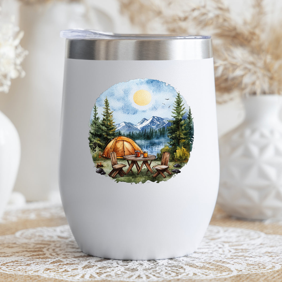 Lakeside Camp Scene UV DTF sticker applied to a stemless wine glass