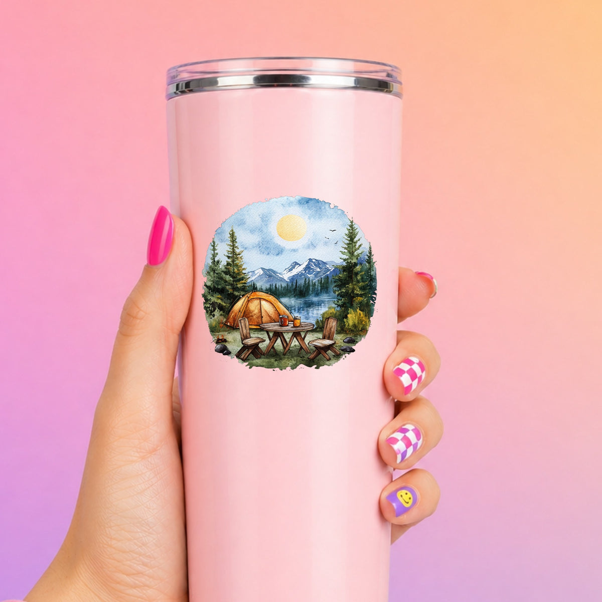 Lakeside Camp Scene UV DTF sticker applied to a pink tumbler