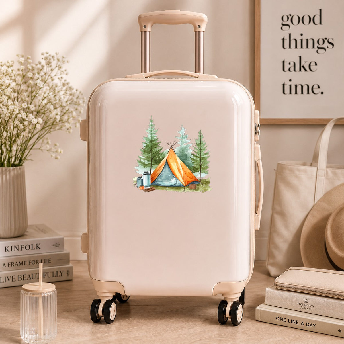 Orange Teepee Tent UV DTF sticker applied to a neutral suitcase