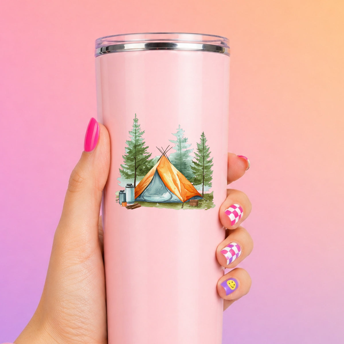 Orange Teepee Tent UV DTF sticker applied to a pink tumbler