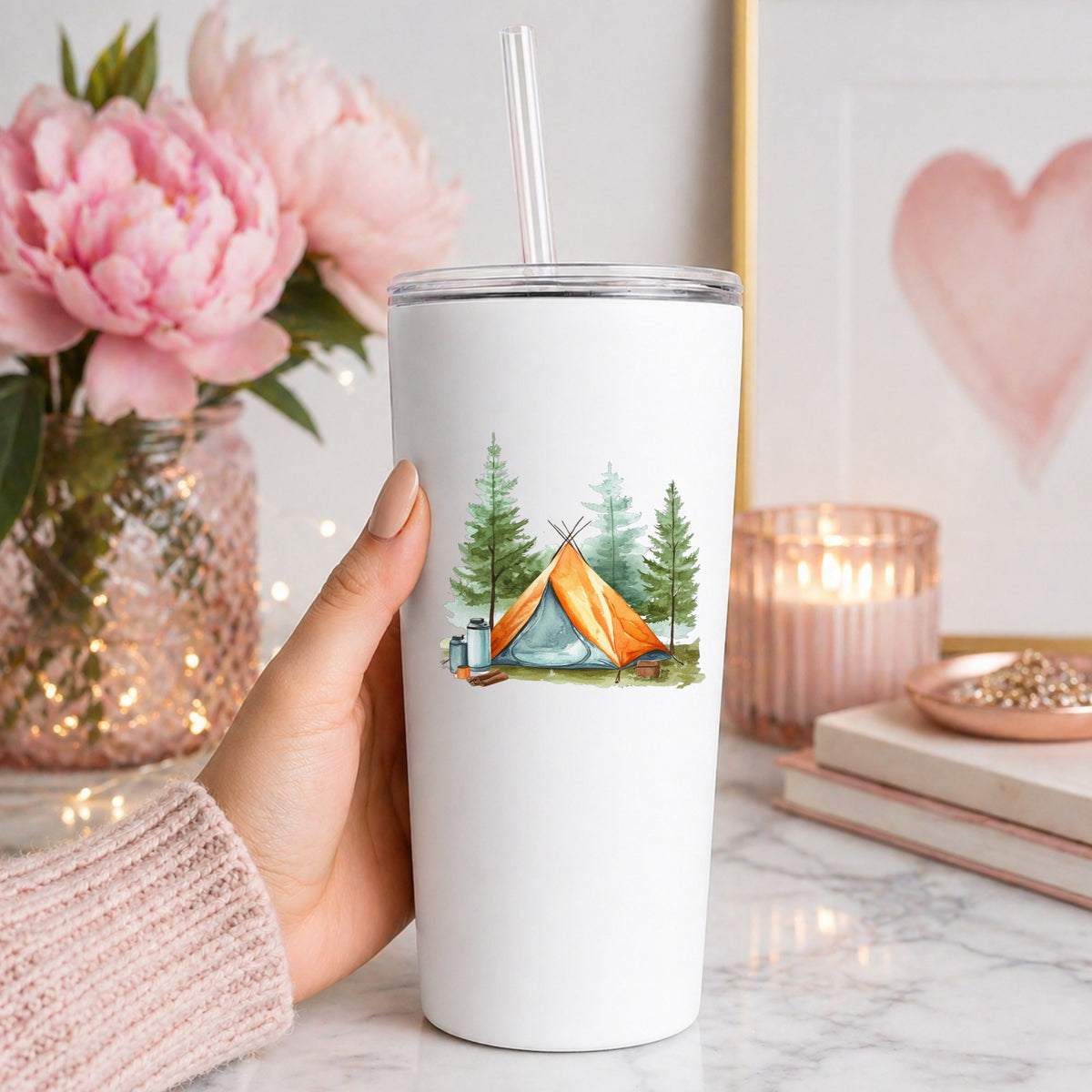 Orange Teepee Tent UV DTF sticker applied to a white tumbler
