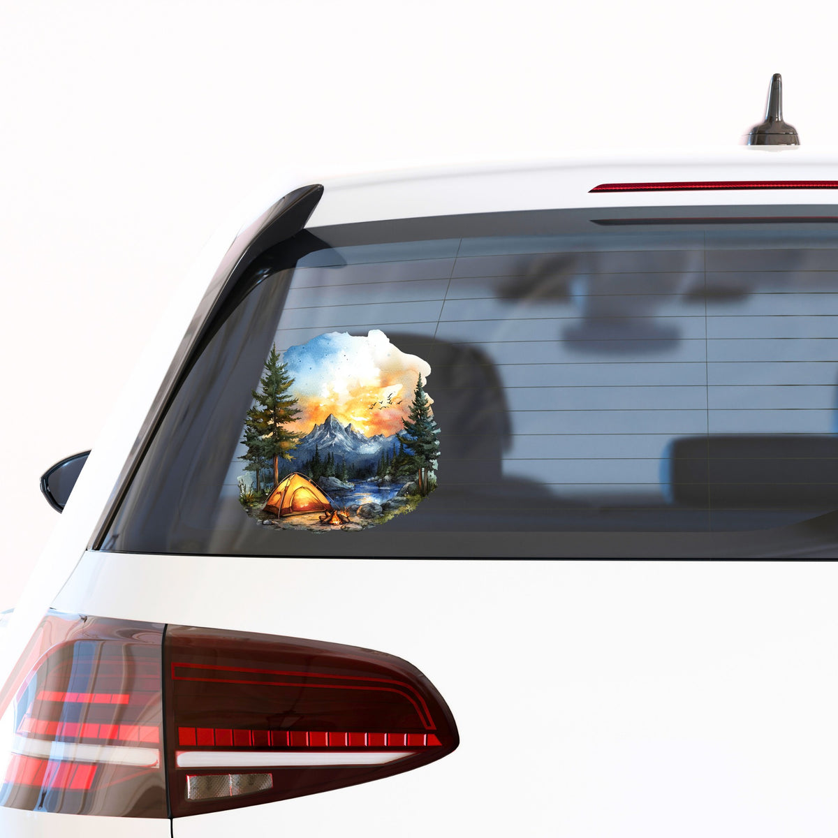Sunset Mountain Campfire UV DTF sticker applied to a car window