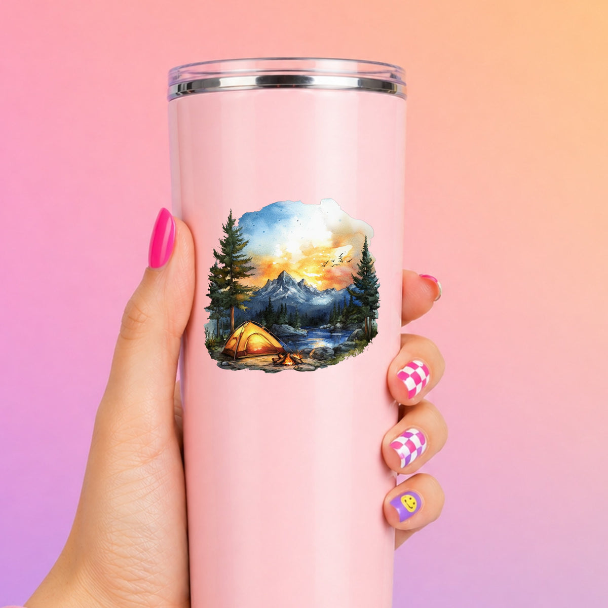 Sunset Mountain Campfire UV DTF sticker applied to a pink tumbler