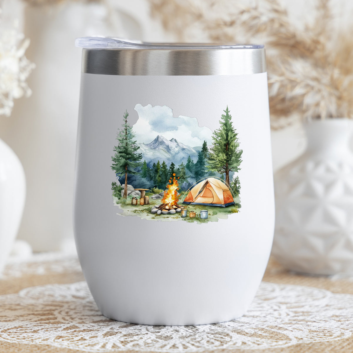 Campfire And Tent With Mugs UV DTF sticker applied to a stemless wine glass