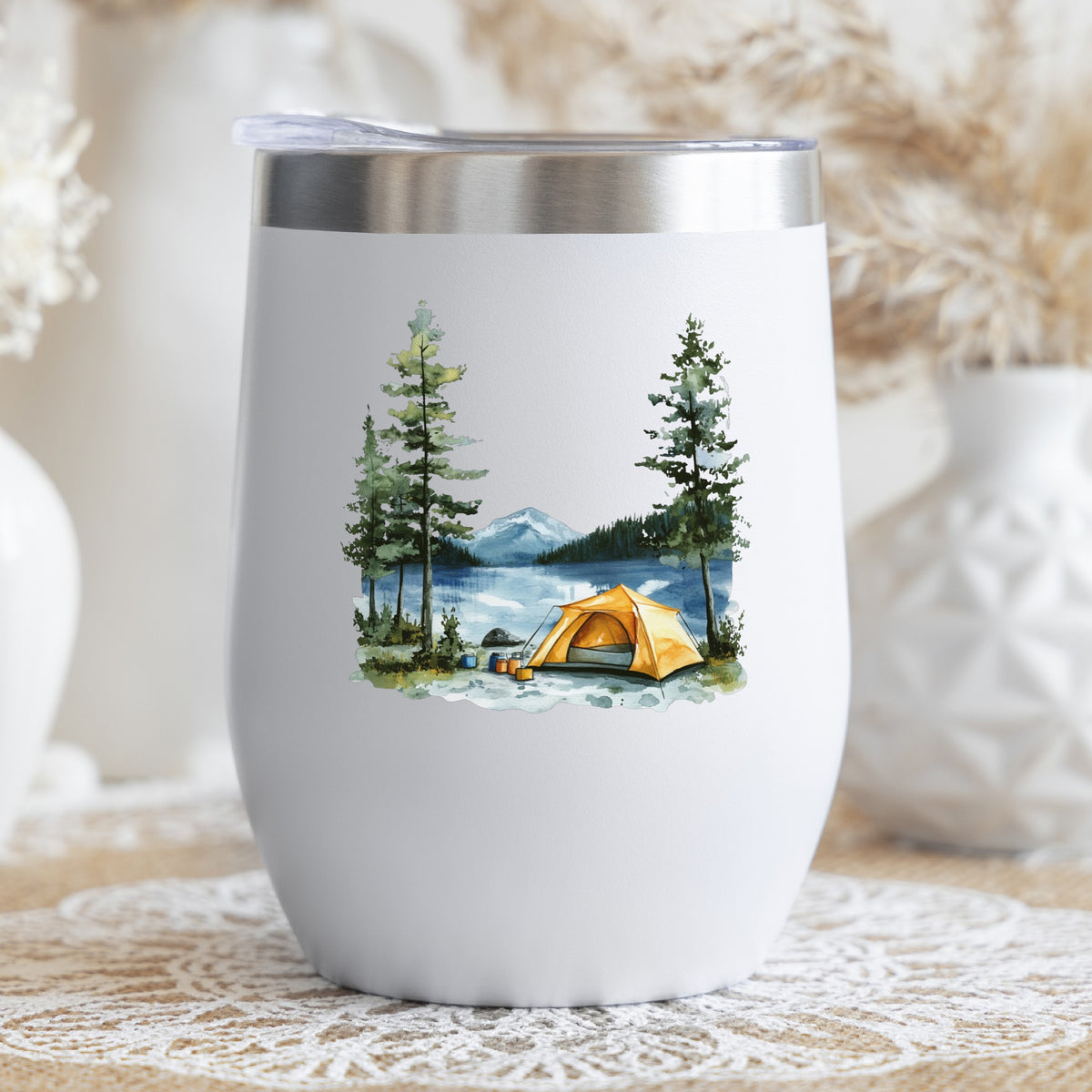 Yellow Tent By Lake UV DTF sticker applied to a stemless wine glass