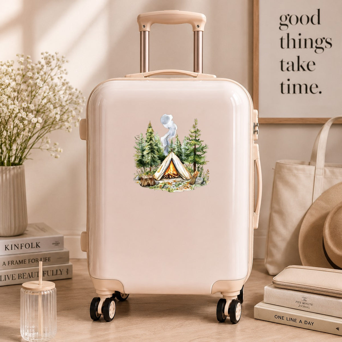 Canvas Teepee With Campfire UV DTF sticker applied to a neutral suitcase