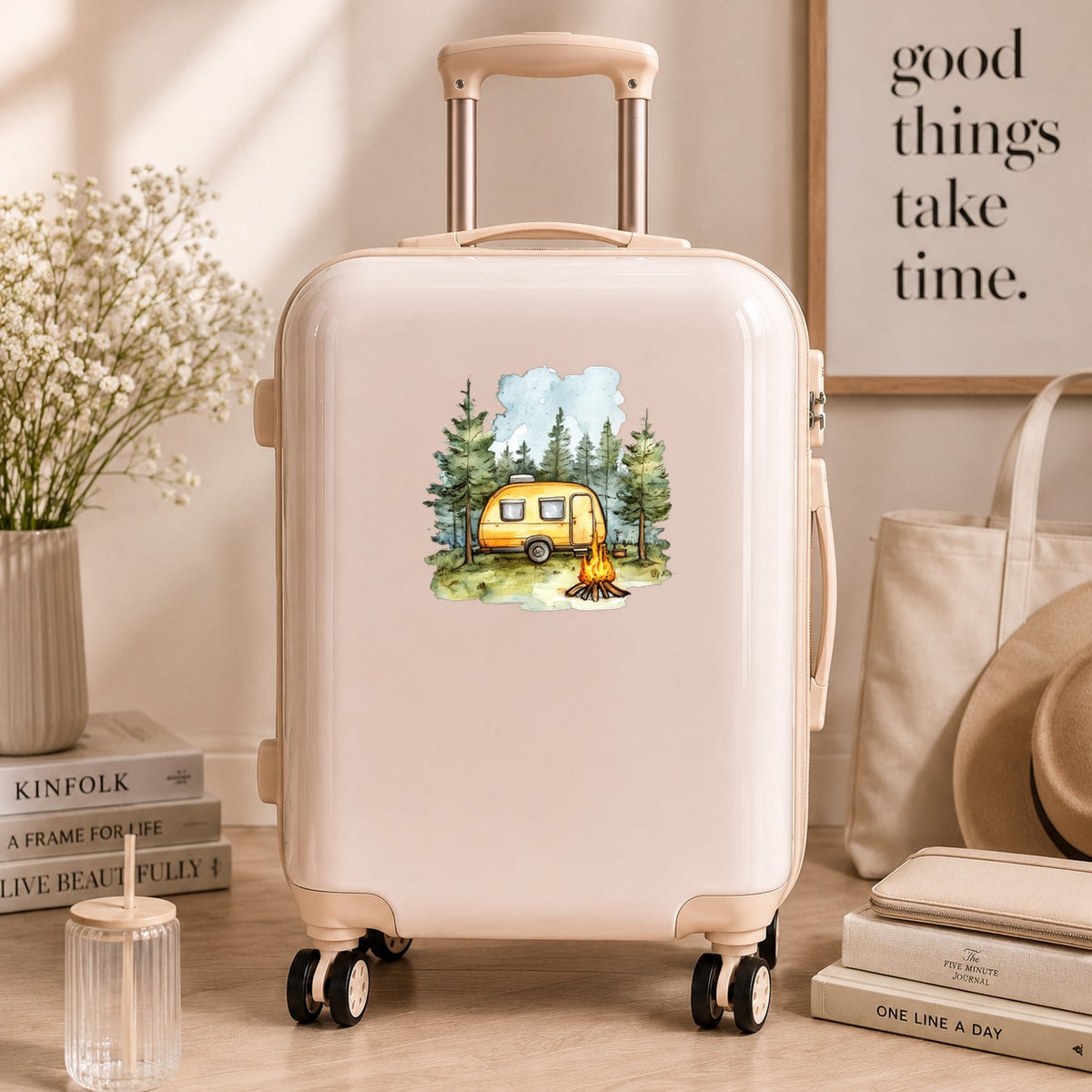 Yellow Camper Trailer UV DTF sticker applied to a neutral suitcase