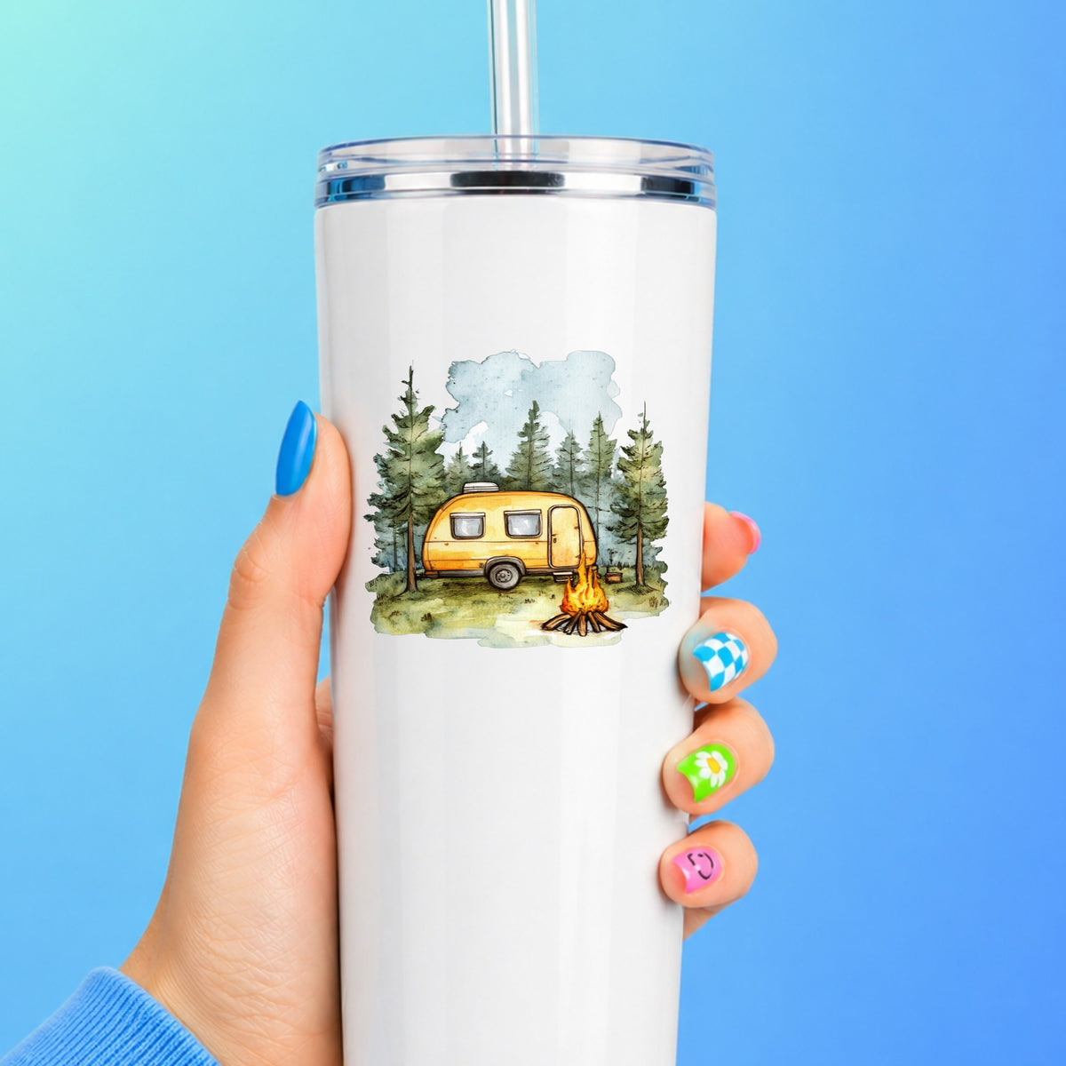 Yellow Camper Trailer UV DTF sticker applied to a white tumbler