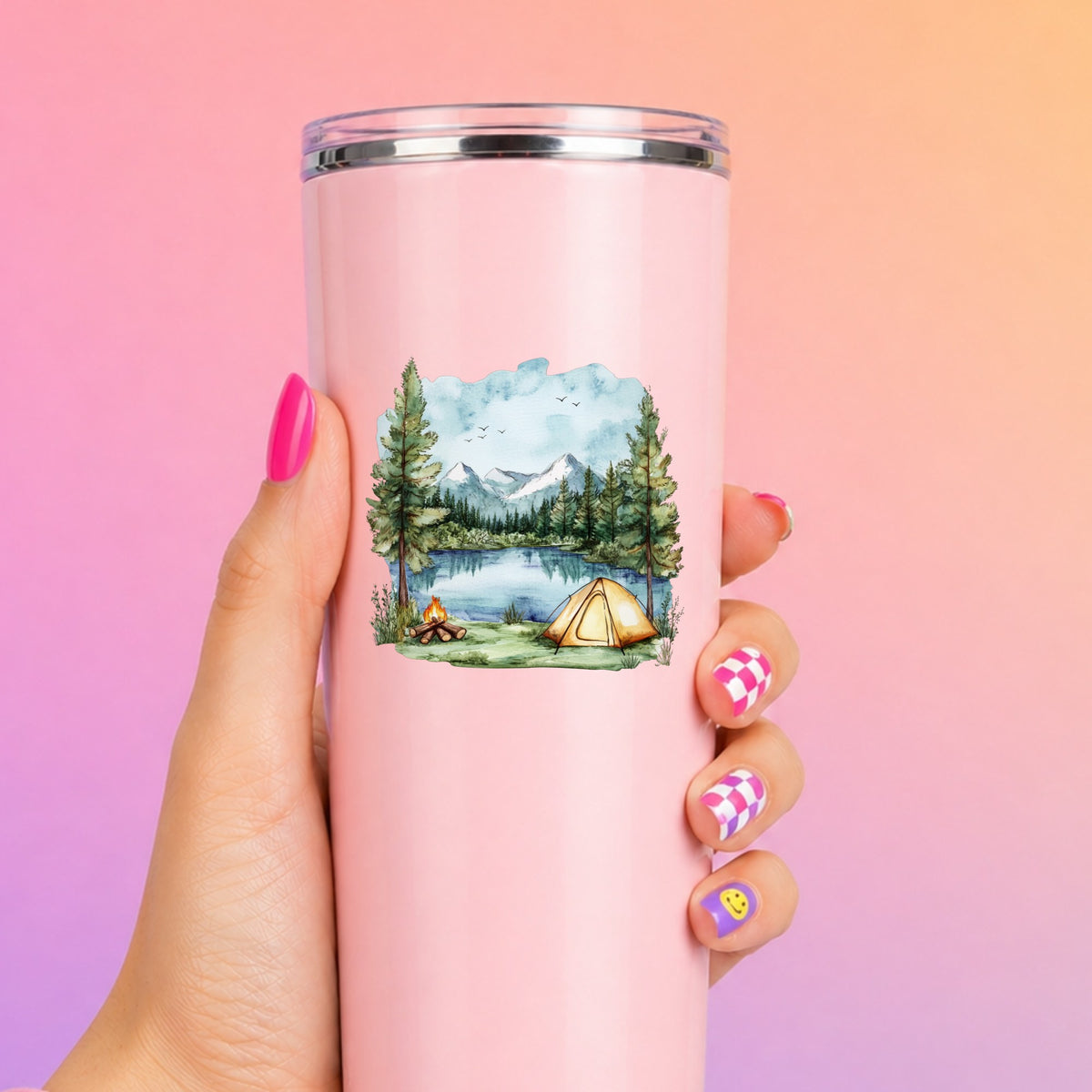 Lake Campfire And Tent UV DTF sticker applied to a pink tumbler