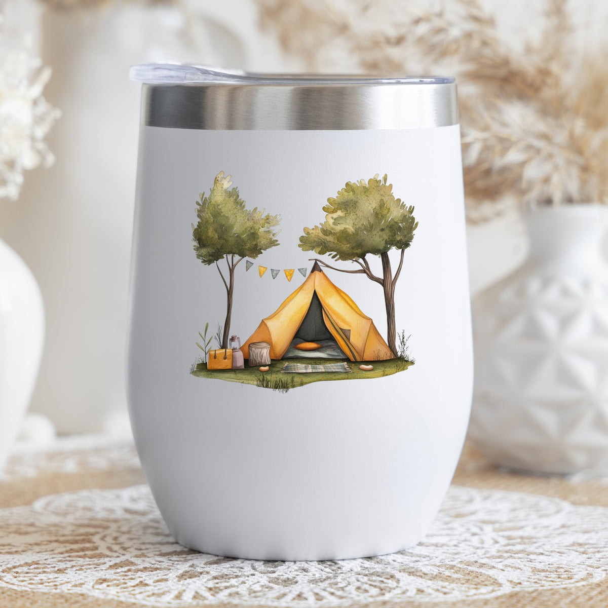 Bunting Flag Camp Tent UV DTF sticker applied to a stemless wine glass