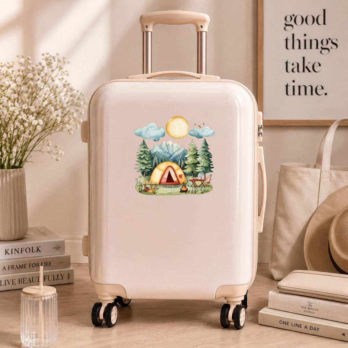 Mountain Camp Tent UV DTF sticker applied to a neutral suitcase