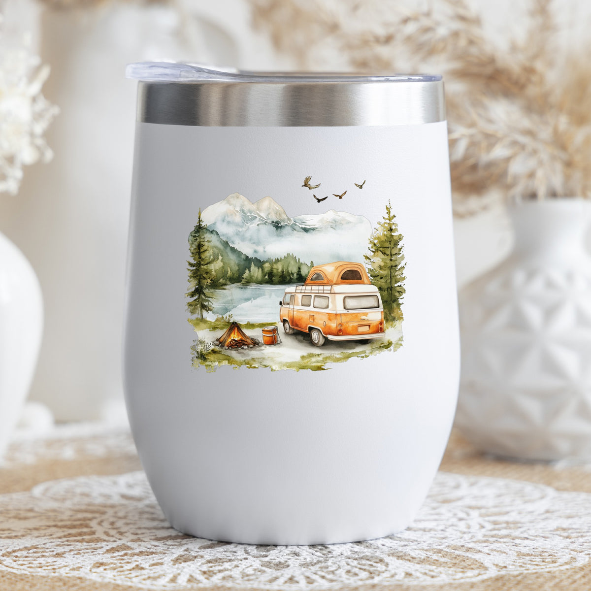 Orange Camper Van UV DTF sticker applied to a stemless wine glass