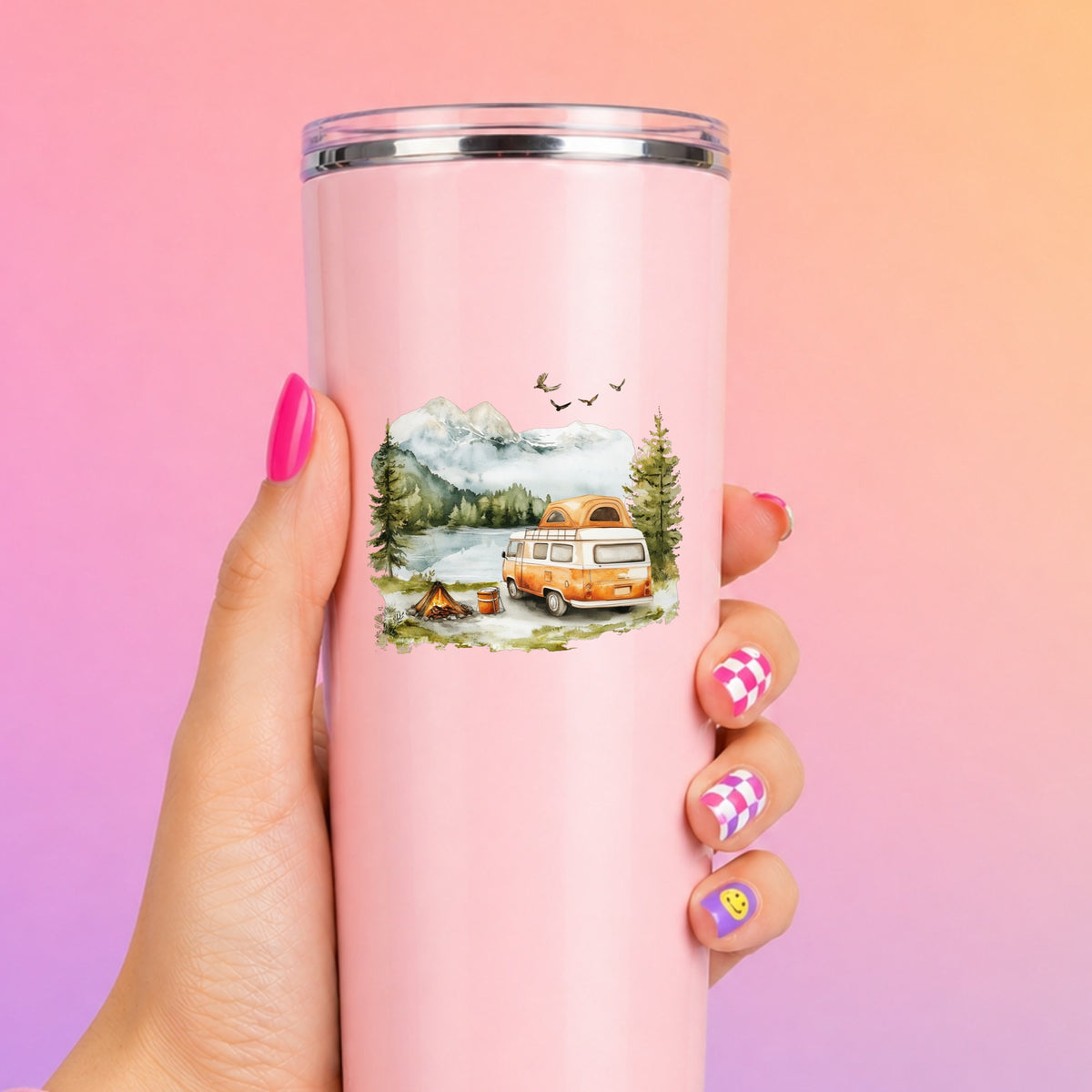 Orange Camper Van UV DTF sticker applied to a pink tumbler