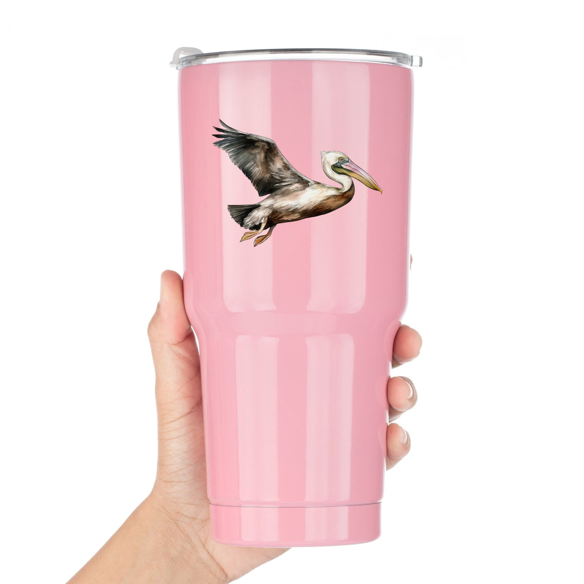 Flying Brown Pelican UV DTF sticker applied to a pink tumbler
