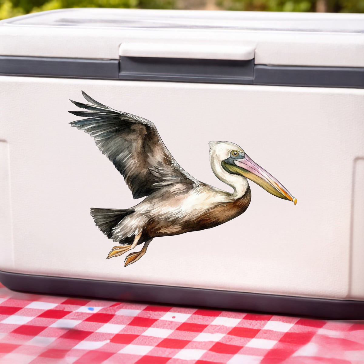 Flying Brown Pelican UV DTF sticker applied to a white cooler