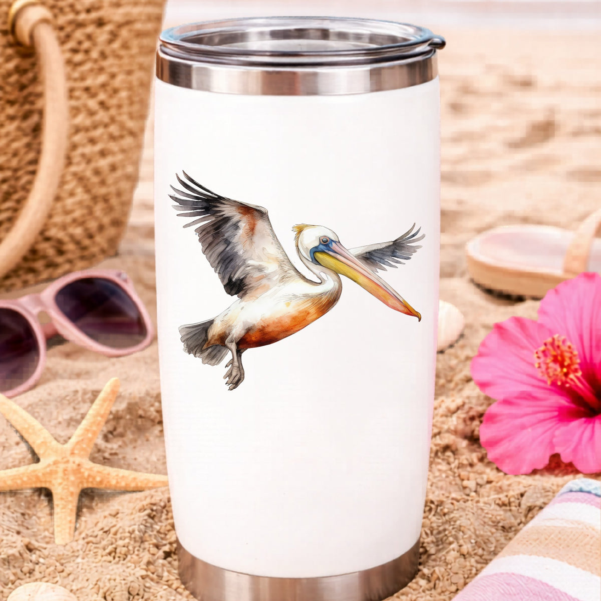 Pelican With Wings Spread UV DTF sticker applied to a water bottle at the beach
