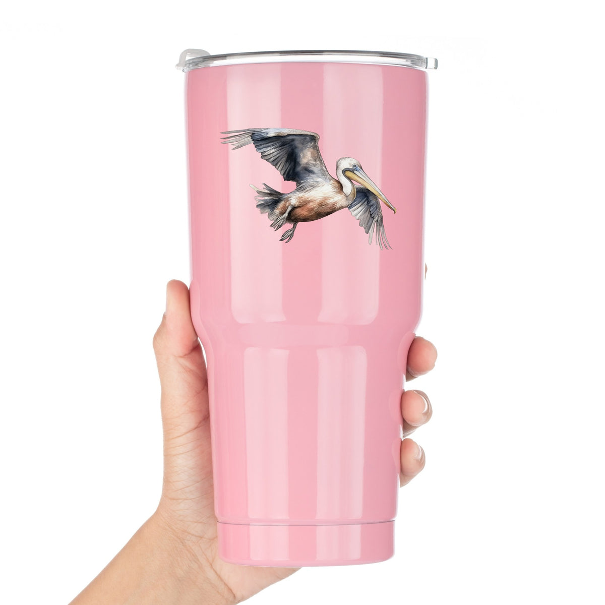 Gliding Gray Pelican UV DTF sticker applied to a pink tumbler