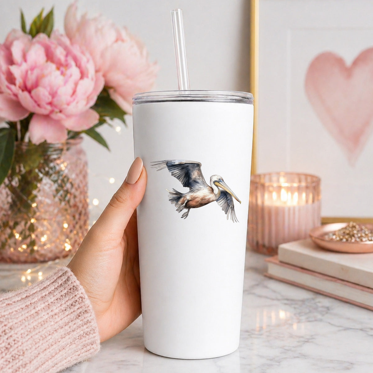 Gliding Gray Pelican UV DTF sticker applied to a white tumbler