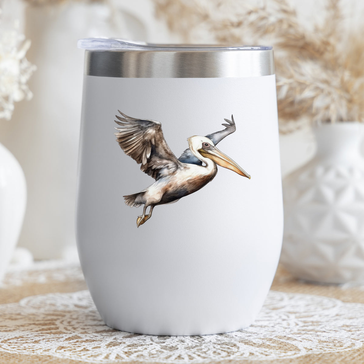 Landing Pelican UV DTF sticker applied to a stemless wine glass