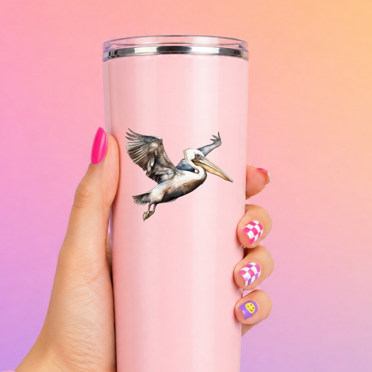Landing Pelican UV DTF sticker applied to a pink tumbler