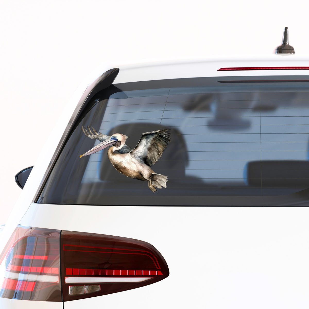 Pelican In Flight UV DTF sticker applied to a car window