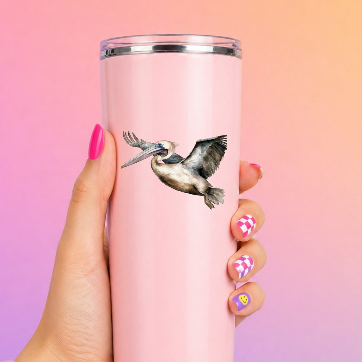 Pelican In Flight UV DTF sticker applied to a pink tumbler