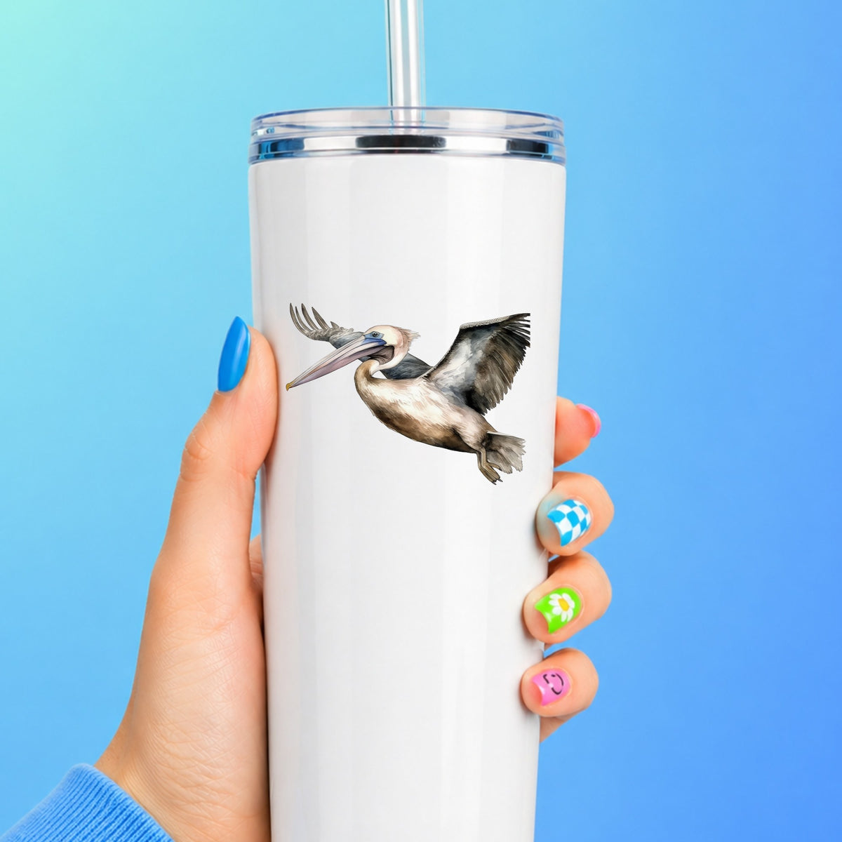 Pelican In Flight UV DTF sticker applied to a white tumbler