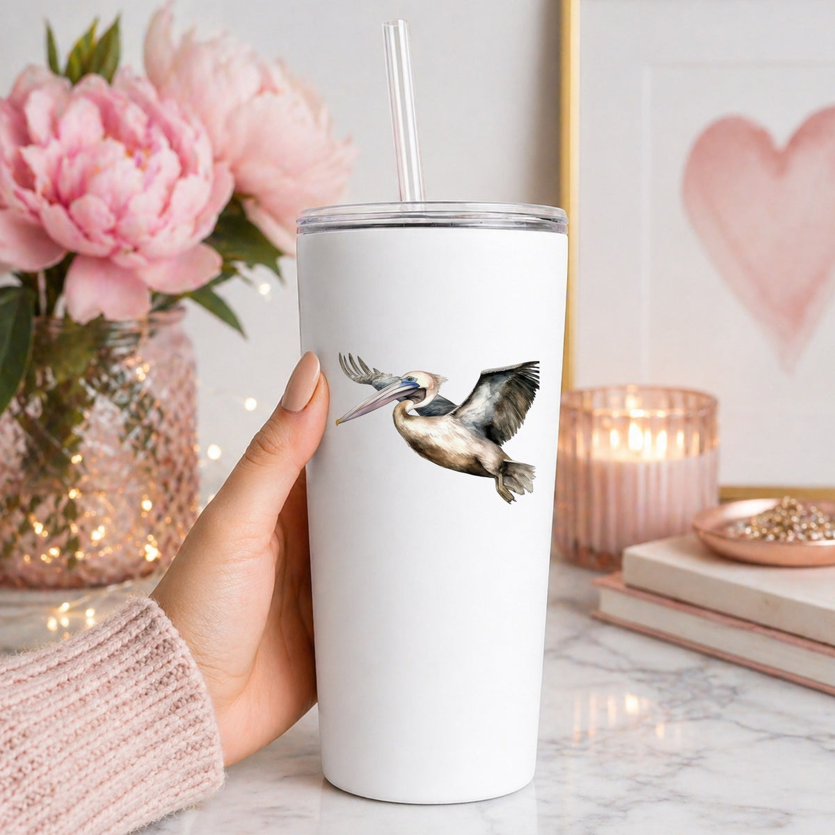 Pelican In Flight UV DTF sticker applied to a white tumbler