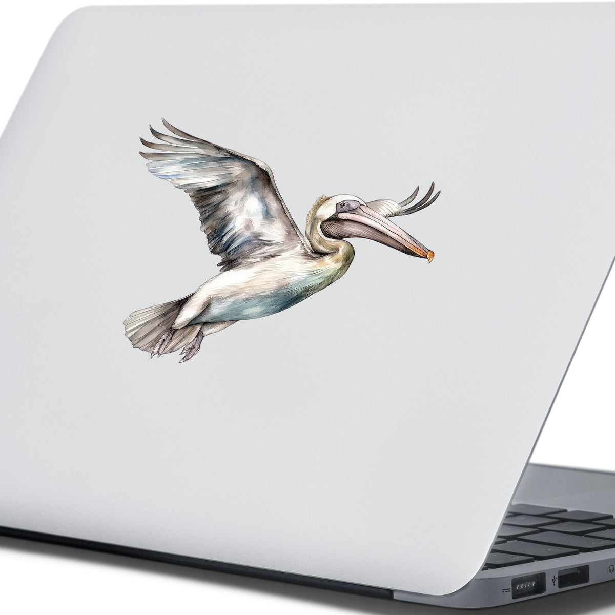 Pale Blue Pelican UV DTF sticker applied to a laptop