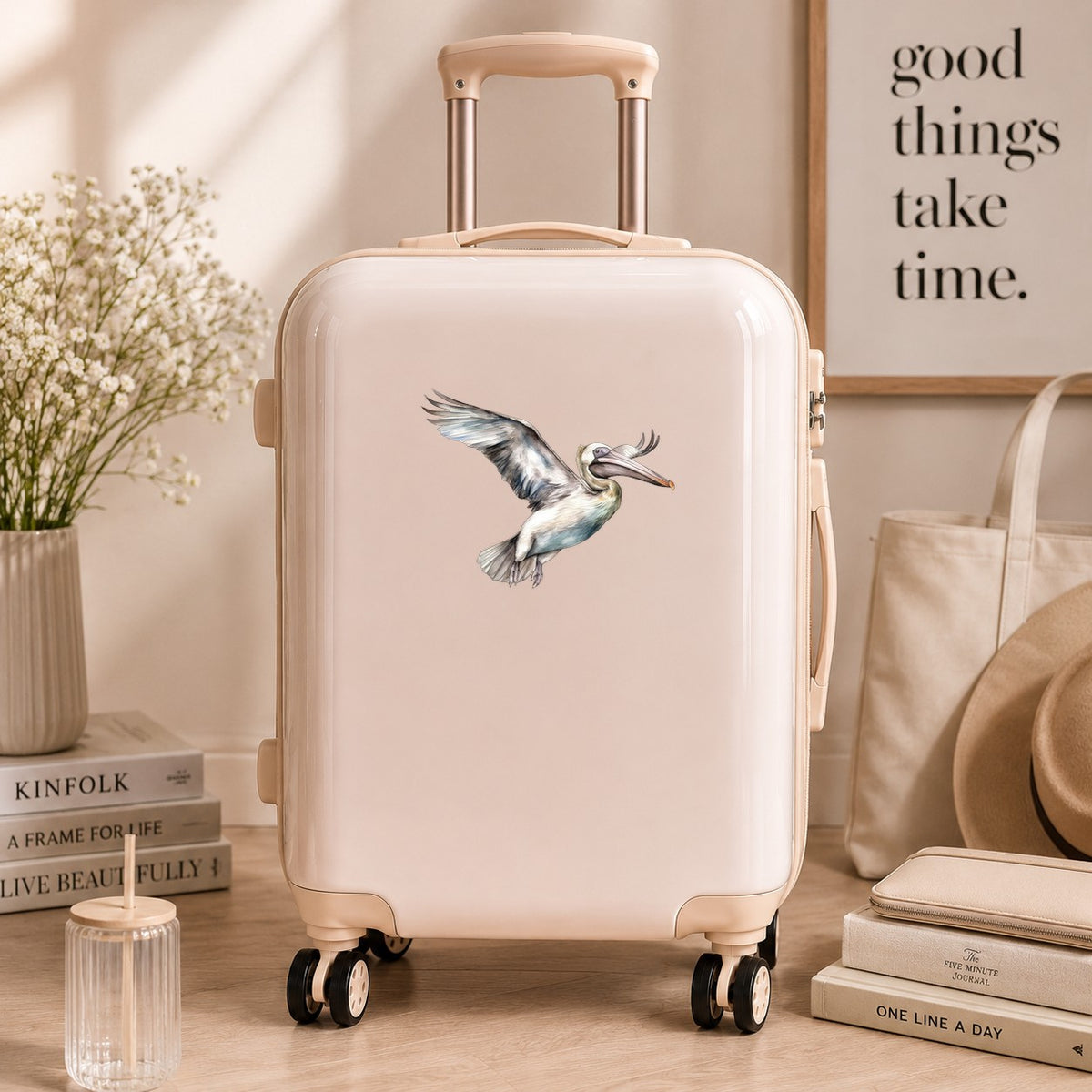 Pale Blue Pelican UV DTF sticker applied to a neutral suitcase