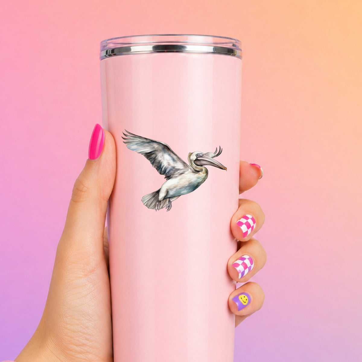 Pale Blue Pelican UV DTF sticker applied to a pink tumbler