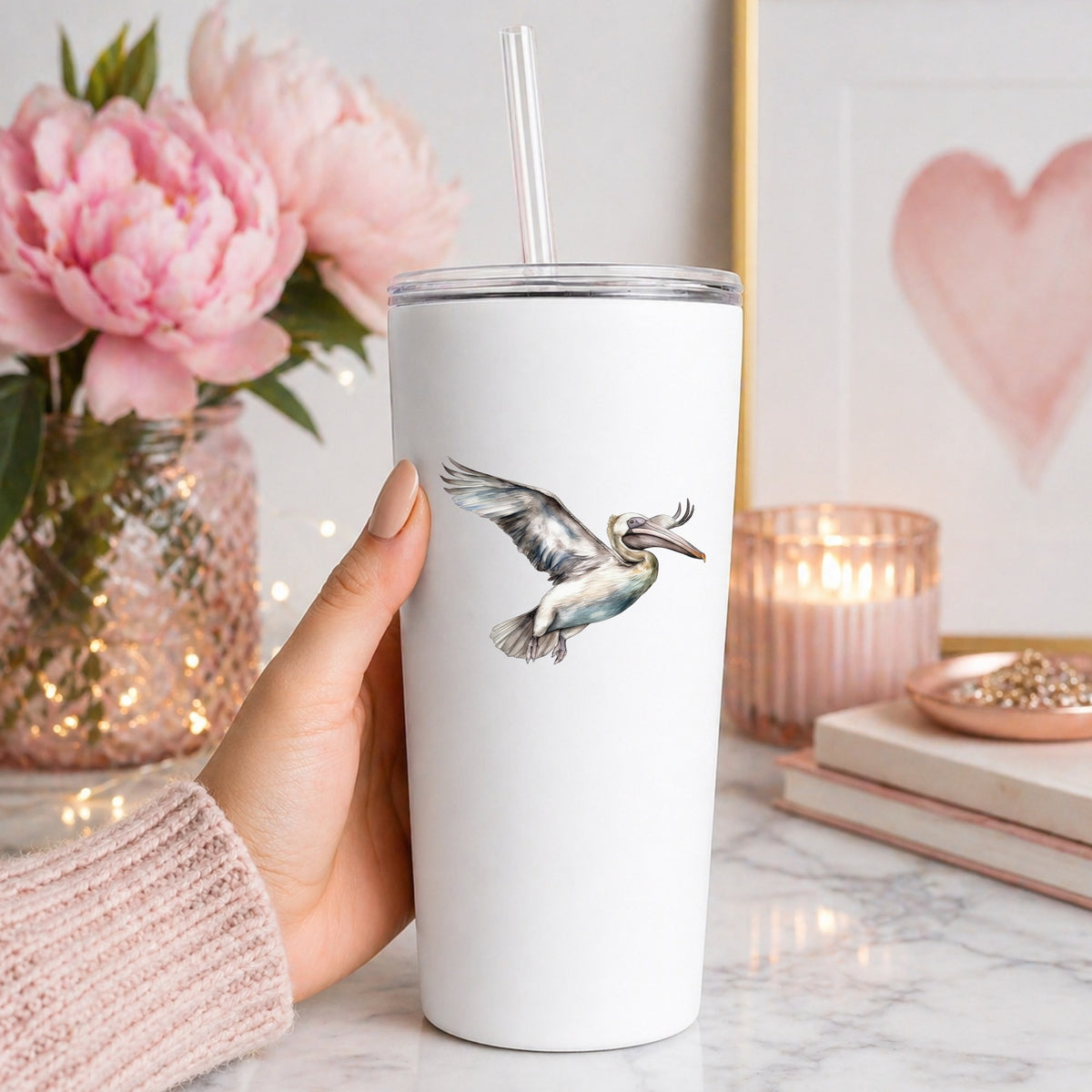 Pale Blue Pelican UV DTF sticker applied to a white tumbler