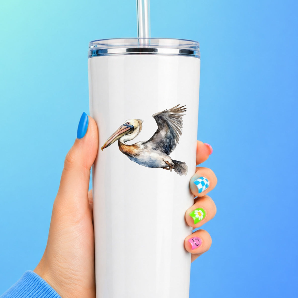 Wide Winged Pelican UV DTF sticker applied to a white tumbler