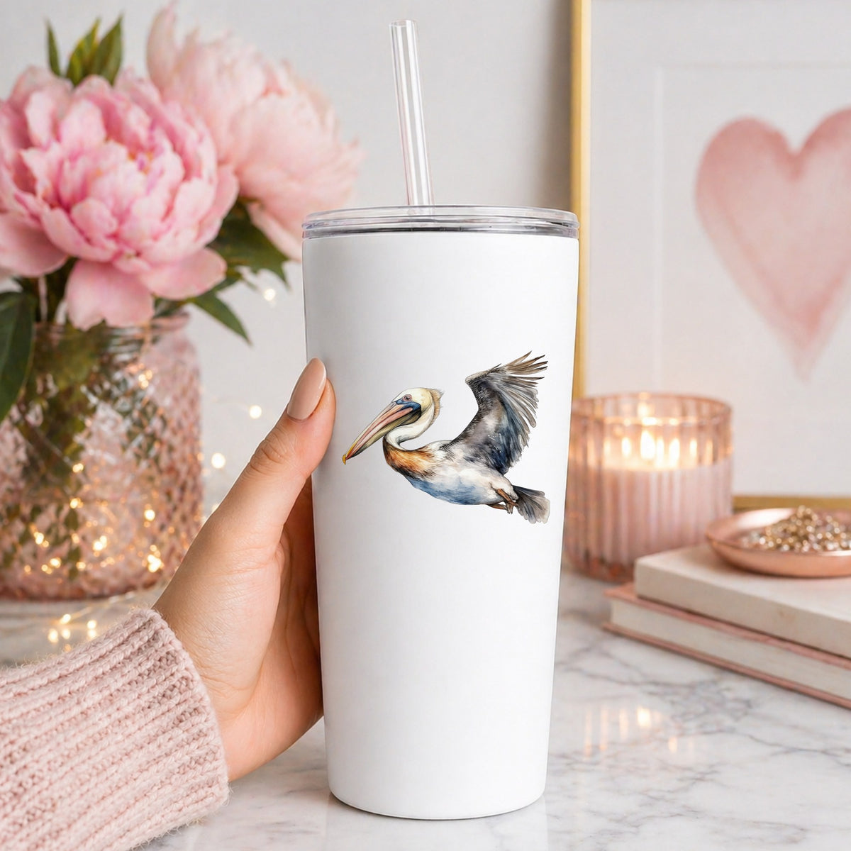 Wide Winged Pelican UV DTF sticker applied to a white tumbler