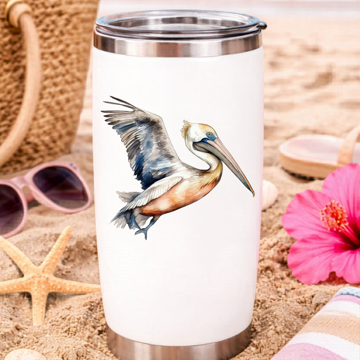 Blue Winged Pelican UV DTF sticker applied to a water bottle at the beach