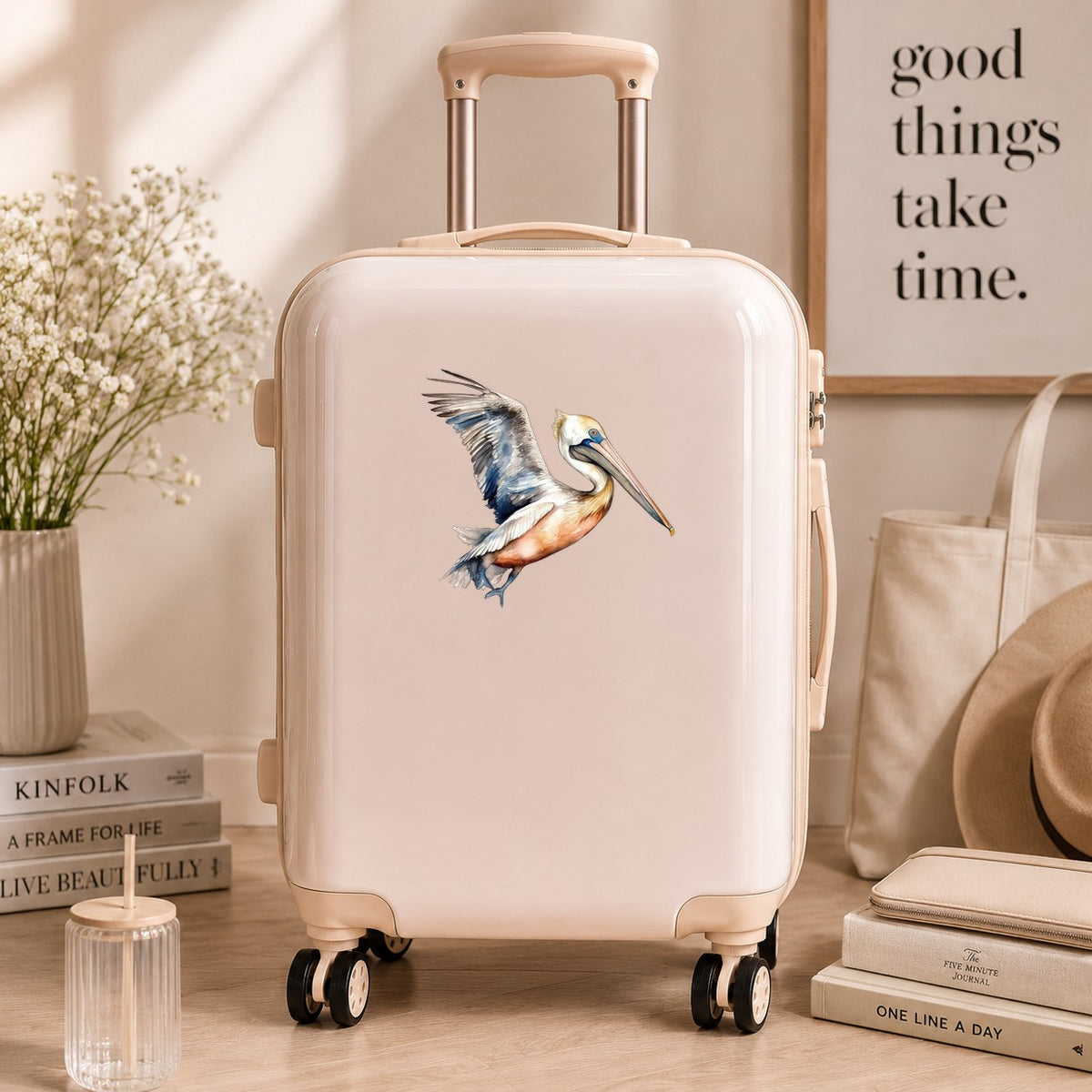 Blue Winged Pelican UV DTF sticker applied to a neutral suitcase